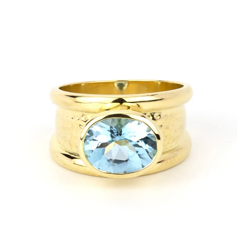 ladies-minimalist-bypass-rings-Repair - Ring - Blue Topaz in 18K Gold (2237E)