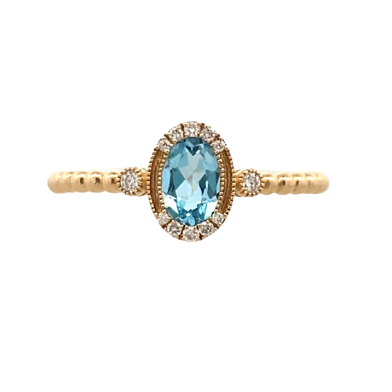 ladies-gold-bypass-rings-Blue Topaz & Diamond Beaded Ring in Yellow Gold