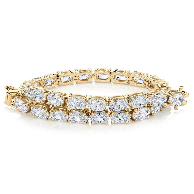 Ladies bracelets for trade elegance -Oval tennis bracelet with 12.04 carats* of diamond simulants in 10 carat yellow gold