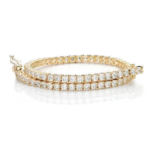 Ladies bracelets artsy charm -Round Brilliant tennis bracelet with 4.38 carats* of diamond simulants in 10 carat yellow gold