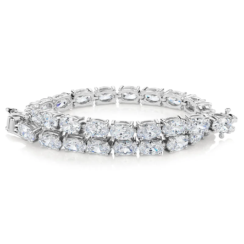 Ladies bracelets for game elegance -Oval tennis bracelet with 12.04 carats* of diamond simulants in 10 carat white gold