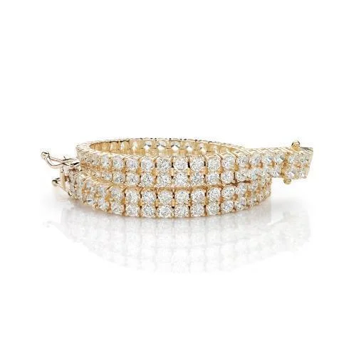 Ladies bracelets cultural flair -Round Brilliant tennis bracelet with 13.86 carats* of diamond simulants in 10 carat yellow gold