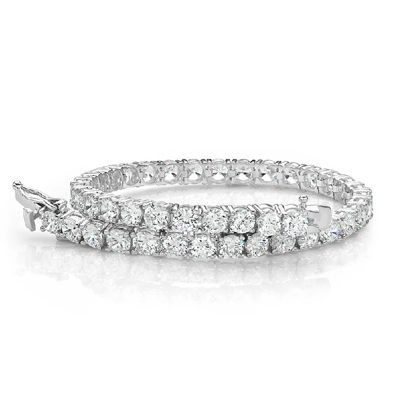 Ladies bracelets for golden vibes -Round Brilliant tennis bracelet with 11 carats* of diamond simulants in 10 carat white gold