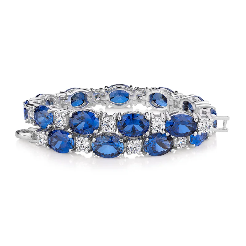 Ladies bracelets for stage charm -Oval and Round Brilliant tennis bracelet with sapphire simulants and 3.36 carats* of diamond simulants in sterling silver