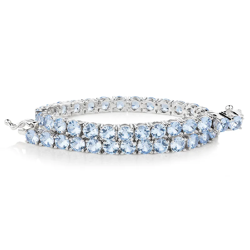 Ladies bracelets for vocal elegance -Round Brilliant tennis bracelet with aquamarine simulants in sterling silver