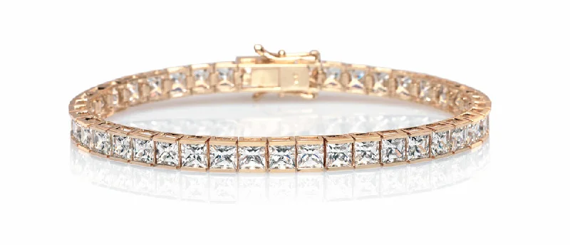 Ladies bracelets for culinary charm -Princess Cut tennis bracelet with 18.72 carats* of diamond simulants in 10 carat yellow gold