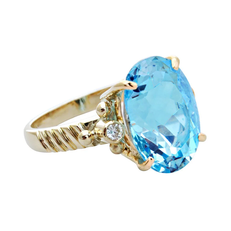 ladies-silver-bypass-rings-Ring-Blue Topaz and Diamond