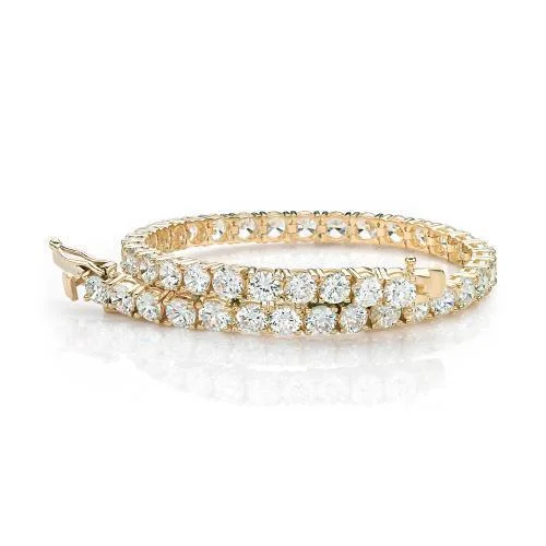 Ladies bracelets for fearless elegance -Round Brilliant tennis bracelet with 12 carats* of diamond simulants in 10 carat yellow gold