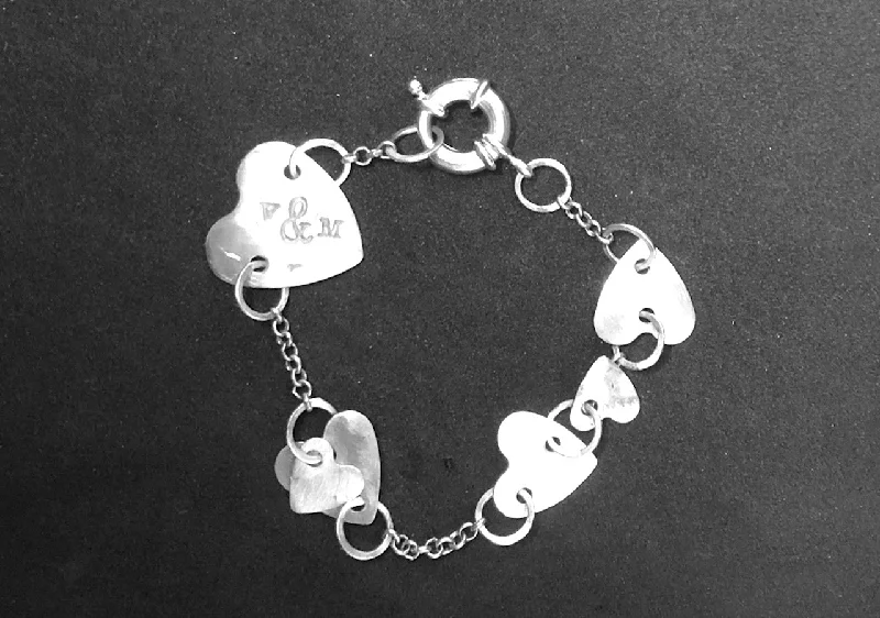 Ladies bracelets for maker vibes -Chain of hearts silver bracelet