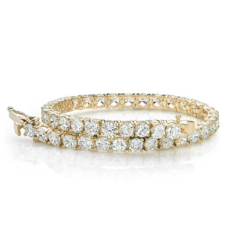 Ladies bracelets for nightlife elegance -Round Brilliant tennis bracelet with 11 carats* of diamond simulants in 10 carat yellow gold