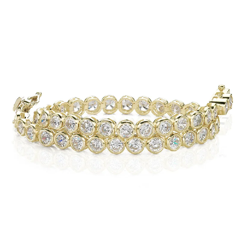 Ladies bracelets for starry elegance -Round Brilliant tennis bracelet with 5.28 carats* of diamond simulants in 10 carat yellow gold