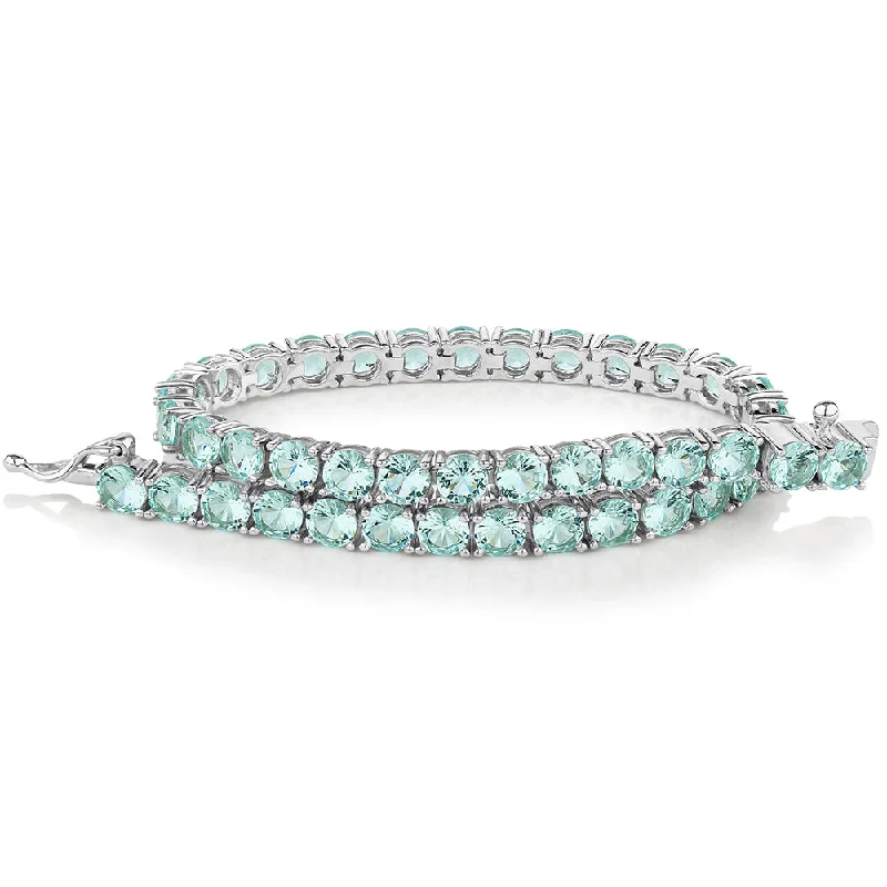 Ladies bracelets for educator vibes -Round Brilliant tennis bracelet with ocean green simulants in sterling silver